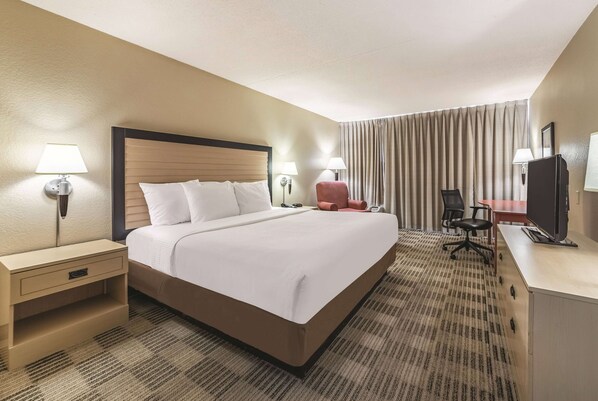 Premium bedding, desk, laptop workspace, iron/ironing board