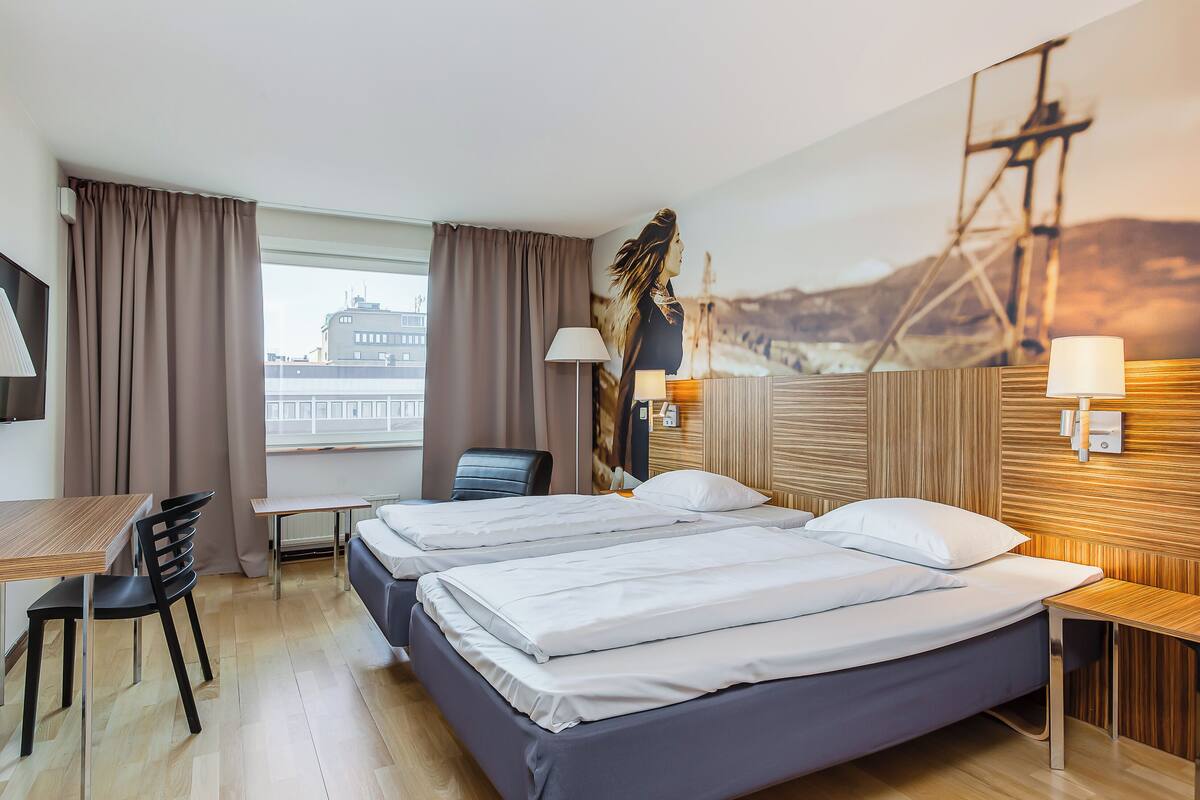 desk, cots/infant beds, free wifi, bed sheets