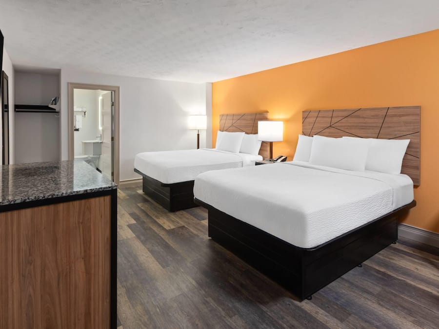 Room, 2 Queen Beds, Non Smoking | In-room safe, free cribs/infant beds, rollaway beds, free WiFi