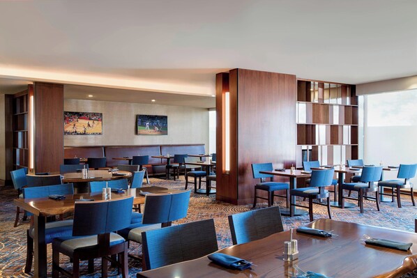Daily buffet breakfast (USD 23 per person)