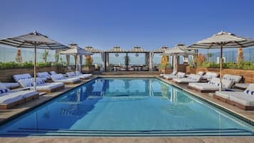 Outdoor pool, open 8:00 AM to 7:00 PM, cabanas (surcharge), sun loungers