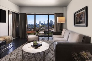 Suíte, 1 cama King e sofá-cama | Vista do quarto