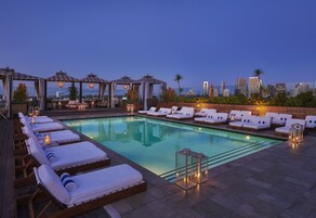 Outdoor pool, open 8:00 AM to 7:00 PM, cabanas (surcharge), sun loungers