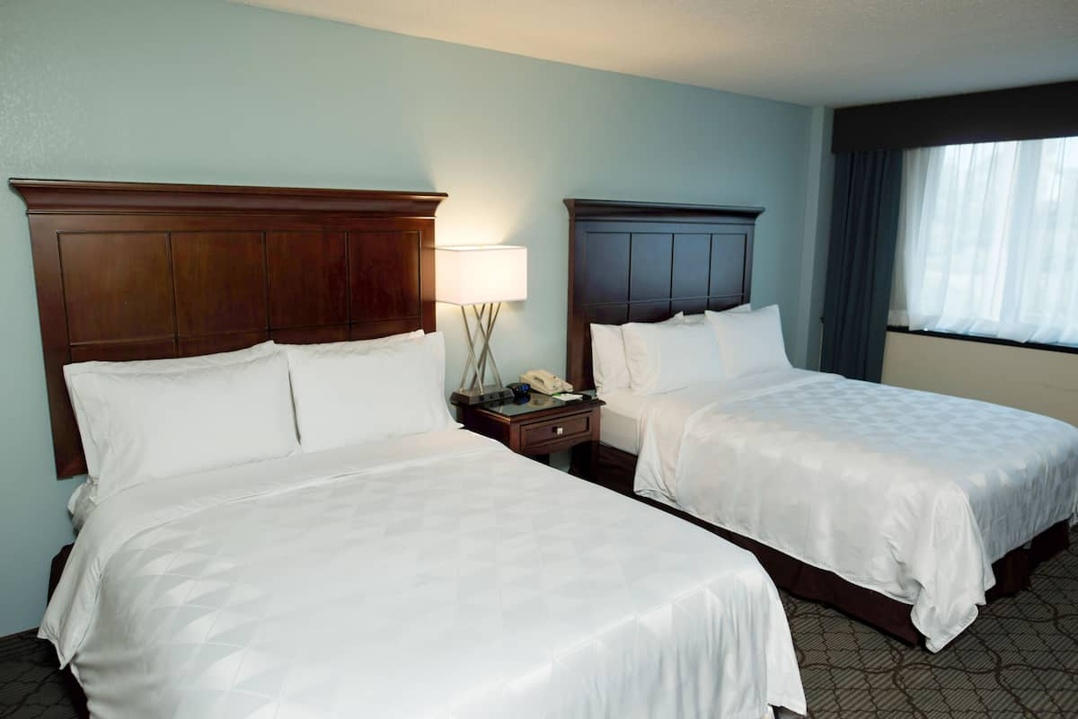 Premium bedding, pillow-top beds, in-room safe, desk