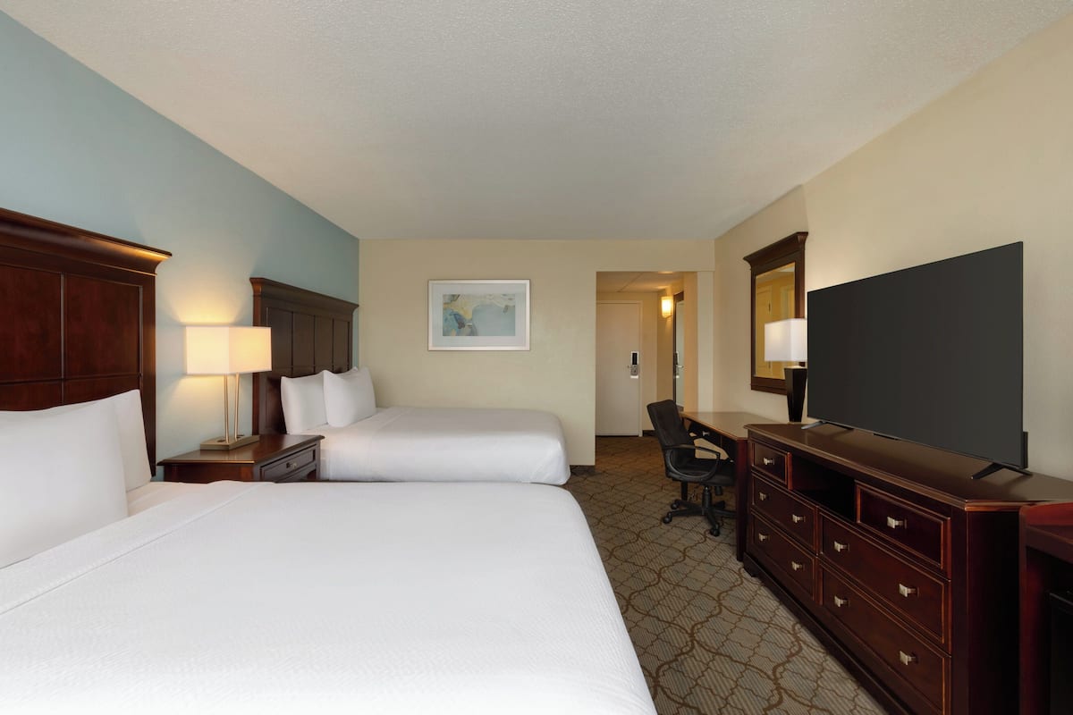 Premium bedding, pillowtop beds, desk, laptop workspace