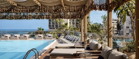 Outdoor pool, open 8:00 AM to 5:00 PM, pool umbrellas, pool loungers