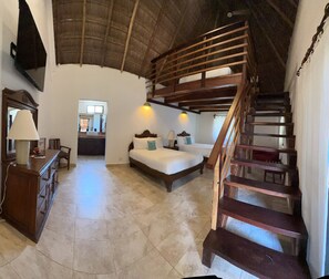 Poolside Suite | 1 bedroom, in-room safe, individually decorated, individually furnished