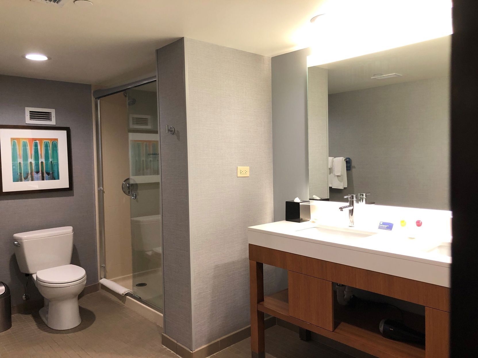 Bathroom | Combined shower/bathtub, designer toiletries, hair dryer, towels