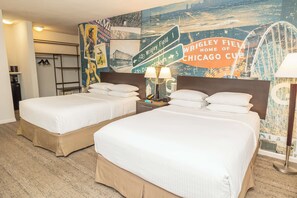 Ropa de cama de alta calidad y caja de seguridad en la habitación