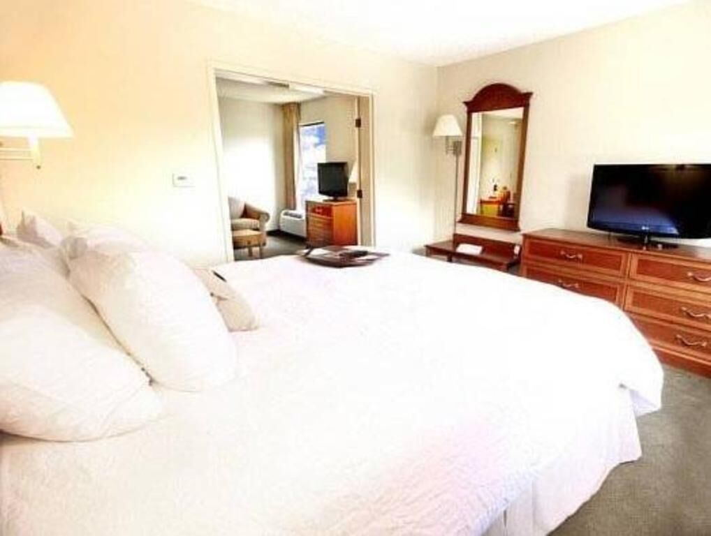 Premium bedding, down duvets, desk, laptop workspace