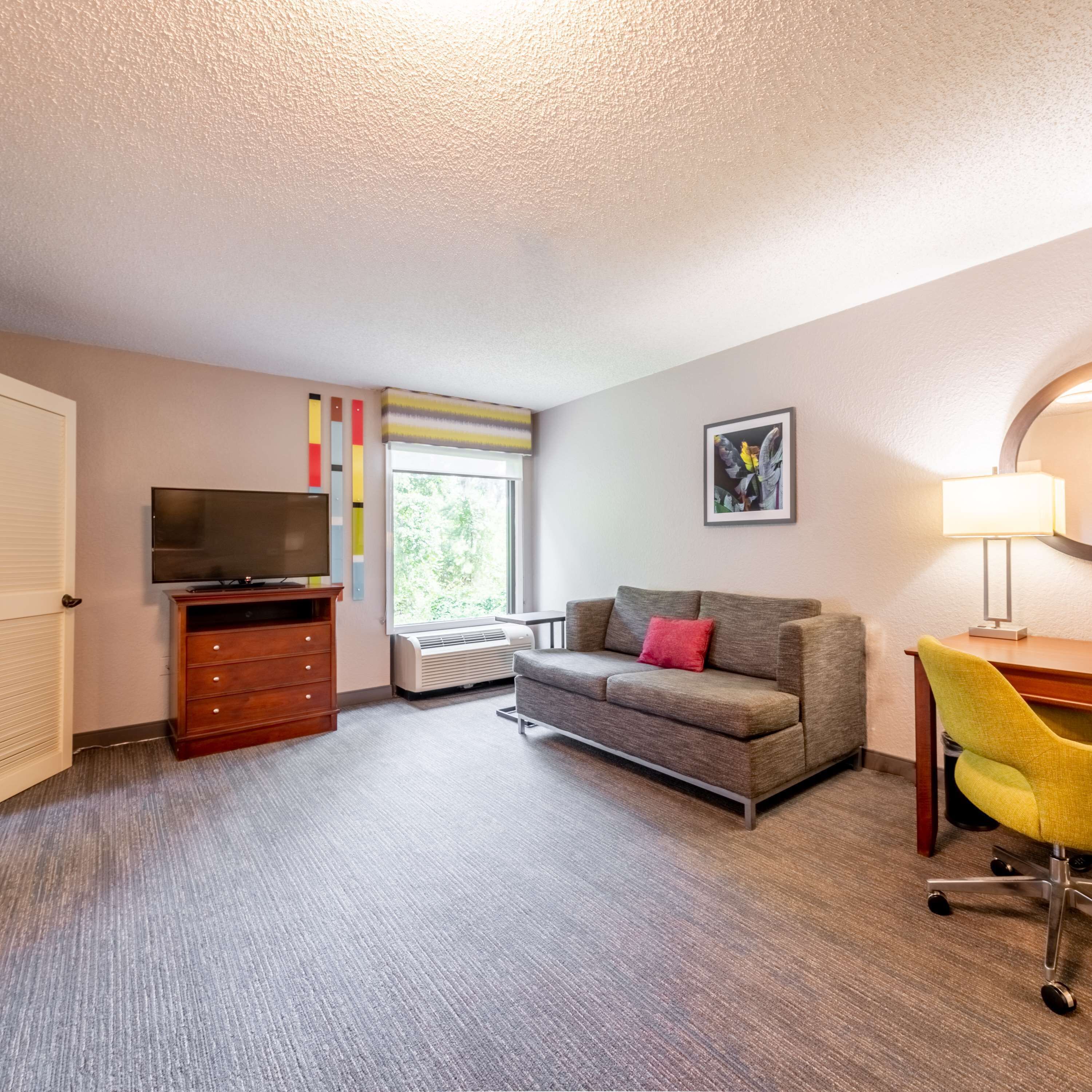 premium bedding, down duvets, desk, laptop workspace