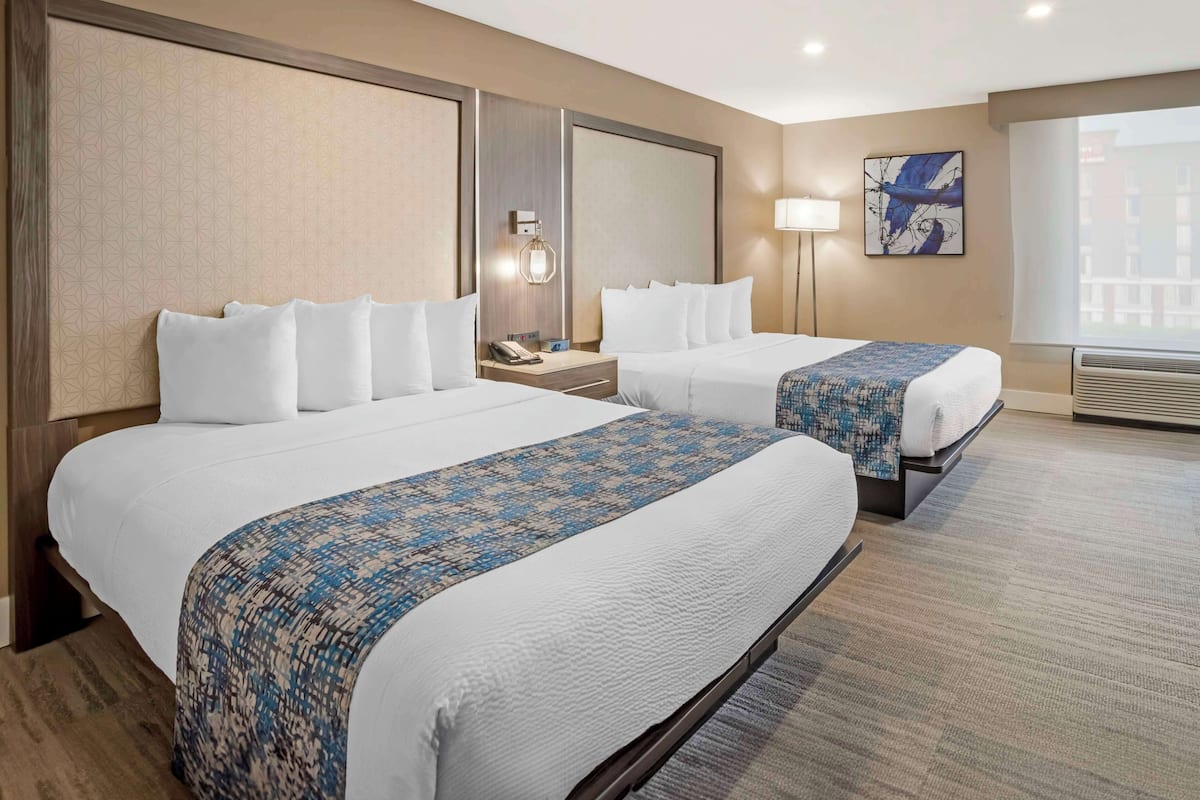 suite, multiple beds, refrigerator & microwave (with sofabed) | 1 bedroom, pillow-top beds, in-room safe, desk