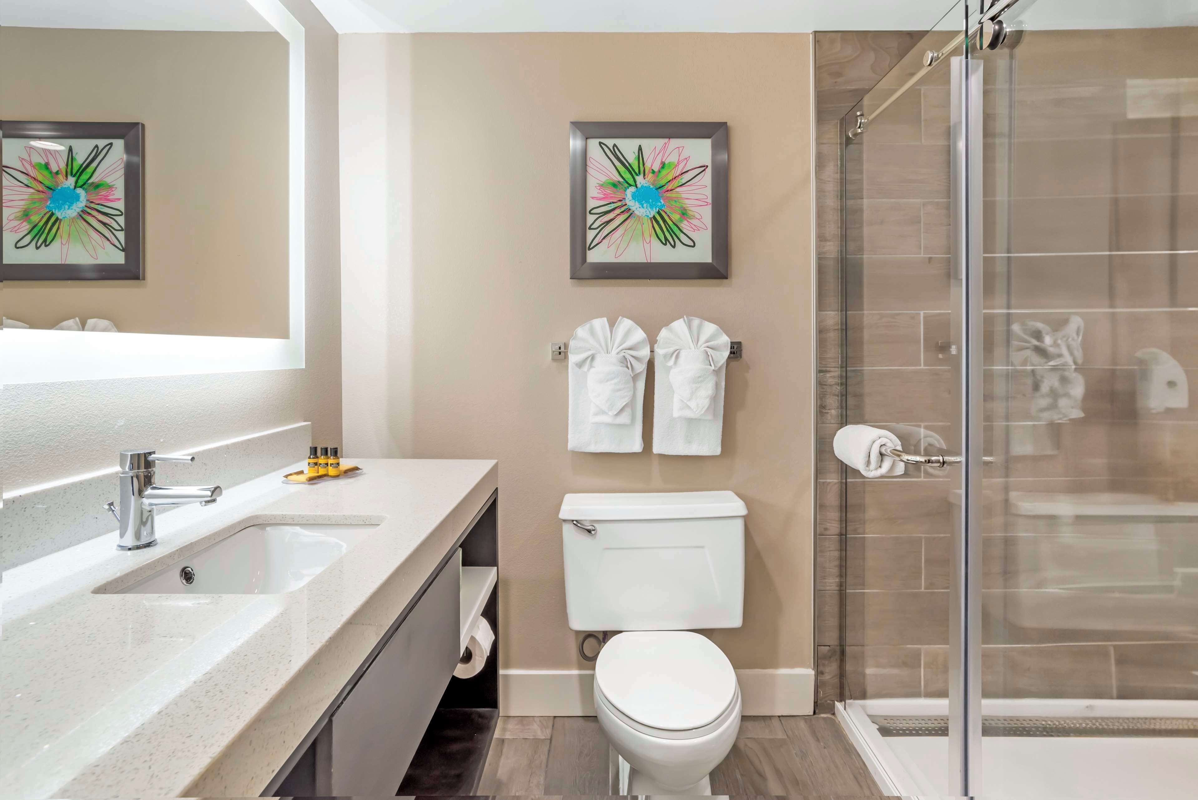 standard room, 2 queen beds, refrigerator & microwave | bathroom | combined shower/bathtub, free toiletries, hair dryer, towels