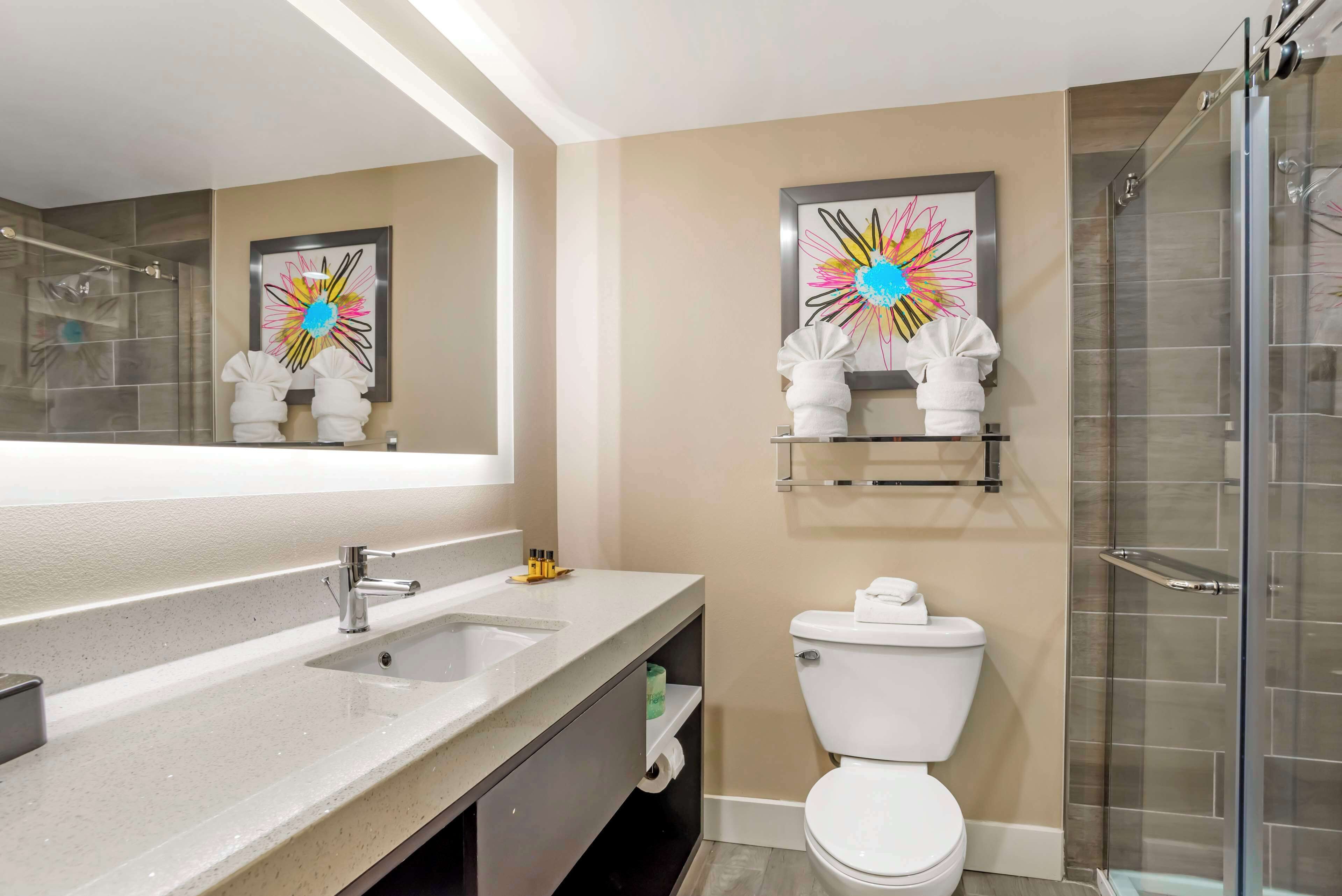 suite, multiple beds, refrigerator & microwave (with sofabed) | bathroom | combined shower/bathtub, free toiletries, hair dryer, towels