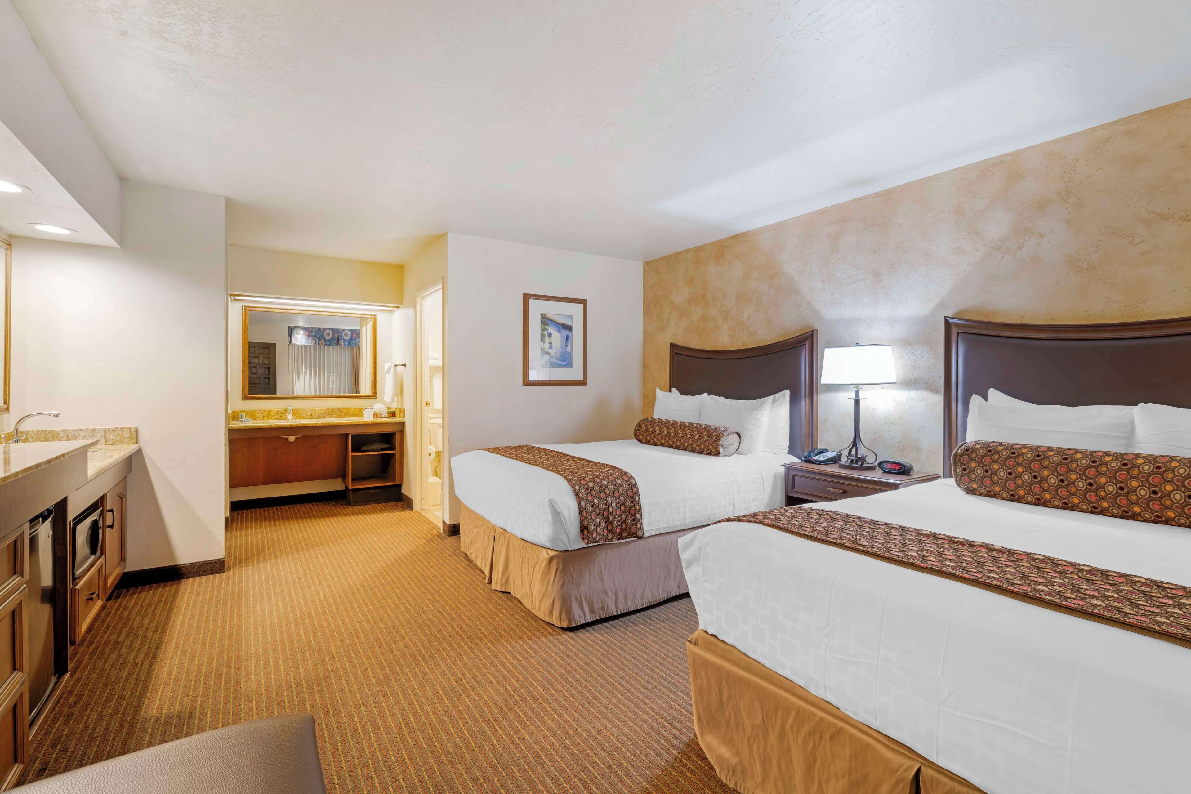 standard room, 2 queen beds, accessible, non smoking (walk-in shower) | in-room safe, desk, iron/ironing board, rollaway beds