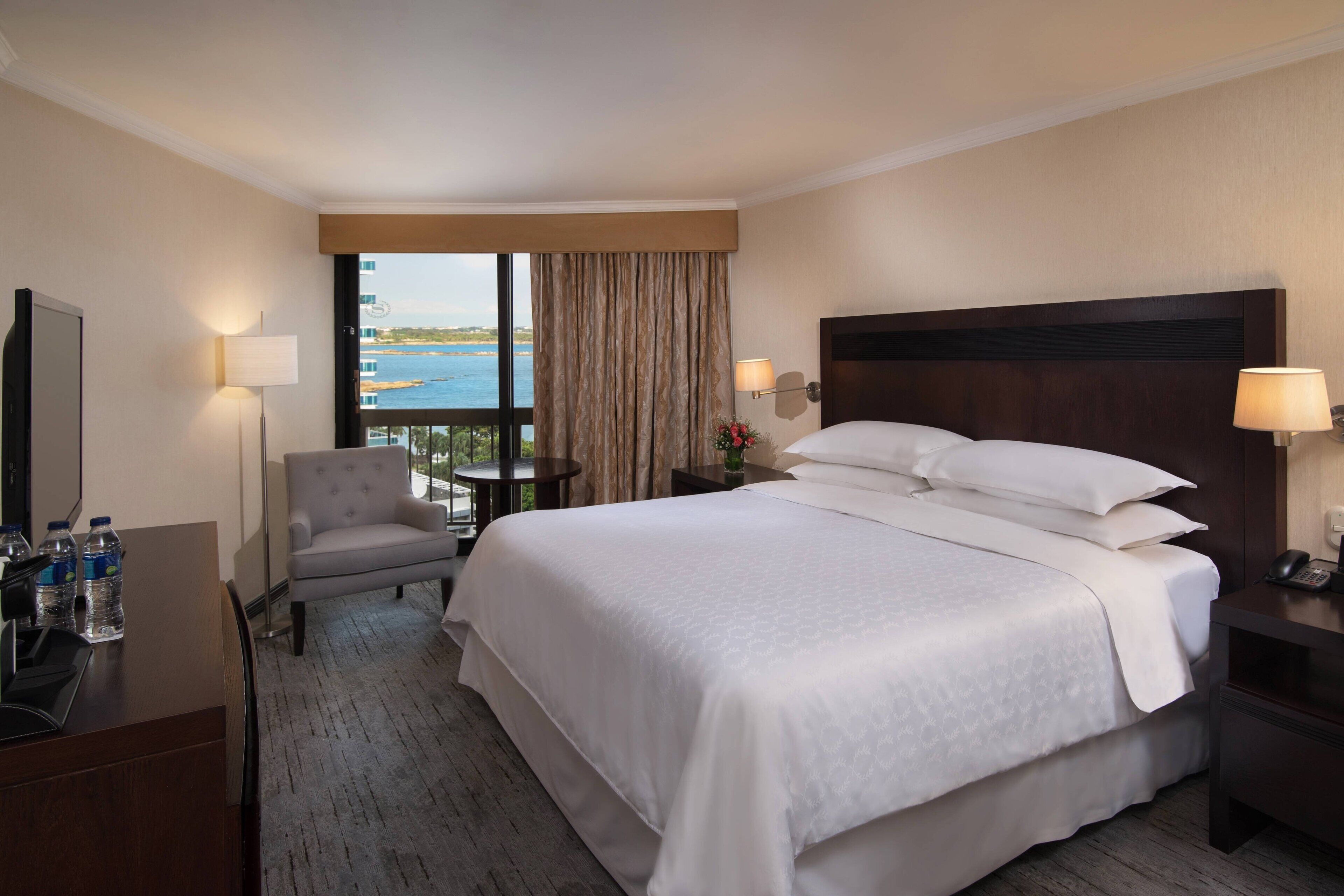 Premium bedding, down comforters, minibar, in-room safe