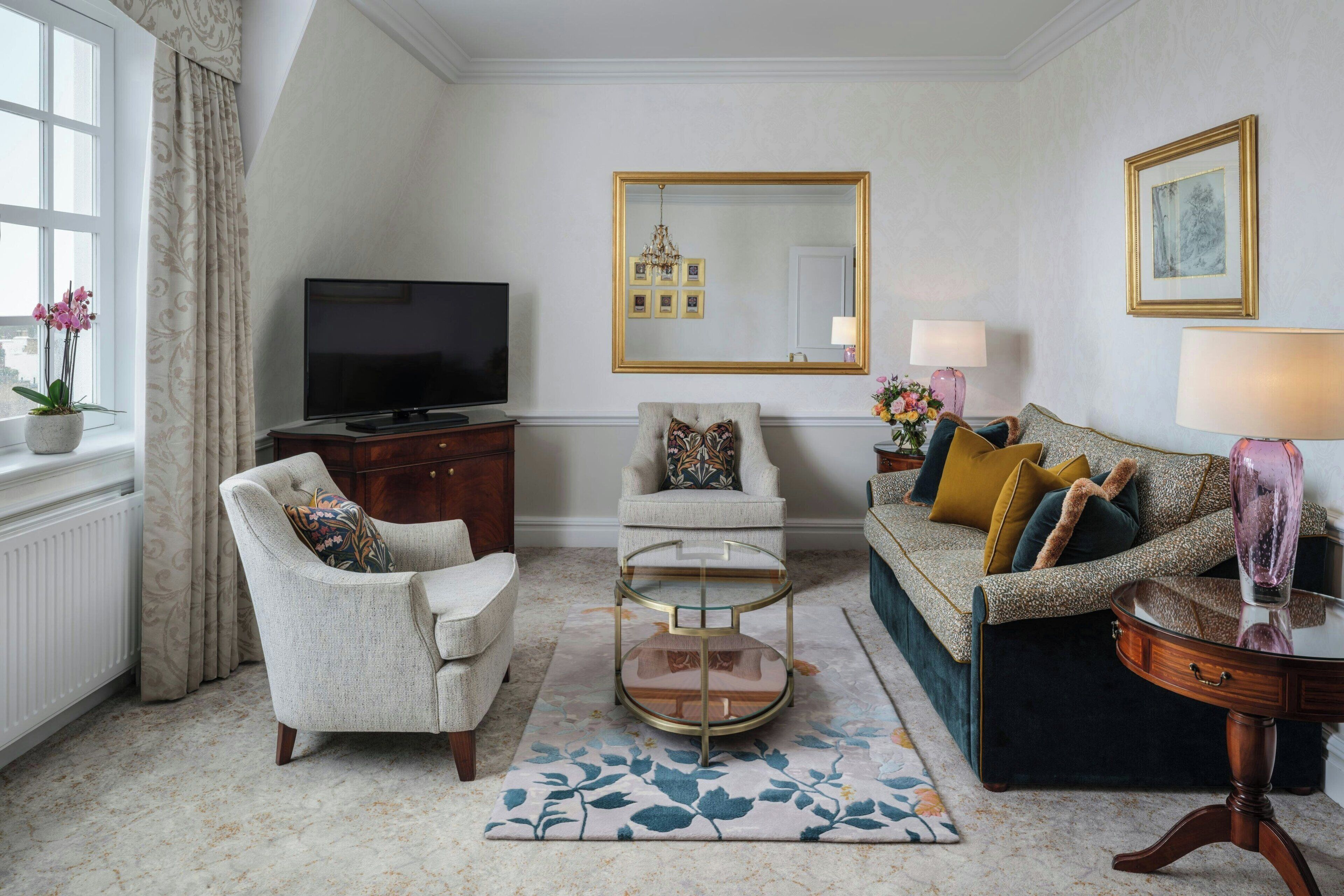 Premium Suite, 2 Bedrooms | Living area | 47-inch TV with satellite channels, DVD player, iPod dock