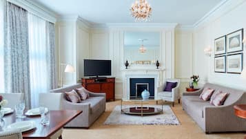 Deluxe Suite, 1 Bedroom, Non Smoking | Living area | 47-inch TV with satellite channels, DVD player, iPod dock