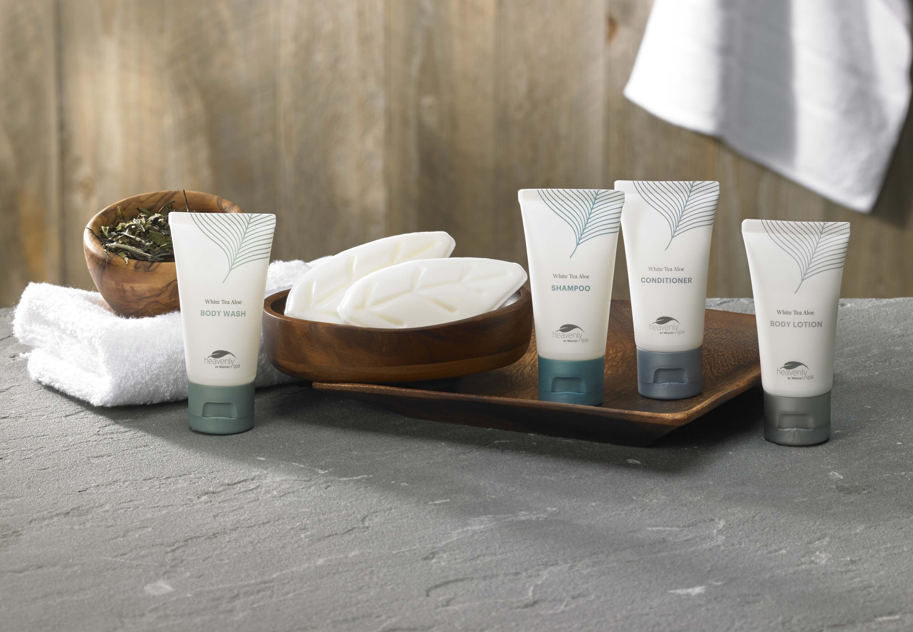 combined shower/bathtub, rainfall showerhead, designer toiletries