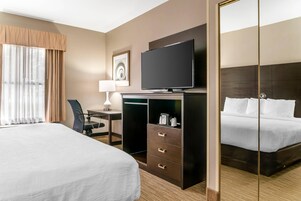 Suite, 1 King Bed with Sofa bed, Accessible, Non Smoking | Desk, laptop workspace, blackout drapes, iron/ironing board