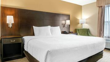 Desk, laptop workspace, blackout drapes, iron/ironing board