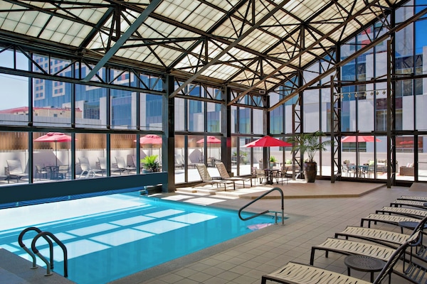 Indoor pool, outdoor pool, open 6:00 AM to 11:00 PM, pool umbrellas
