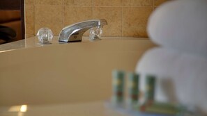 Designer toiletries, hair dryer, towels, soap