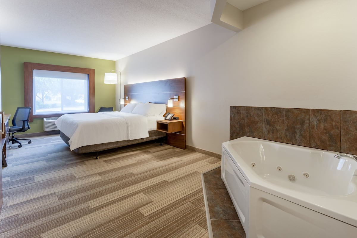 Suite, 1 King Bed, Jetted Tub | In-room safe, desk, blackout curtains, iron/ironing board