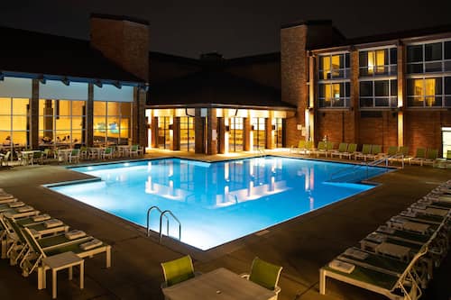 Indoor pool, seasonal outdoor pool, pool umbrellas, pool loungers