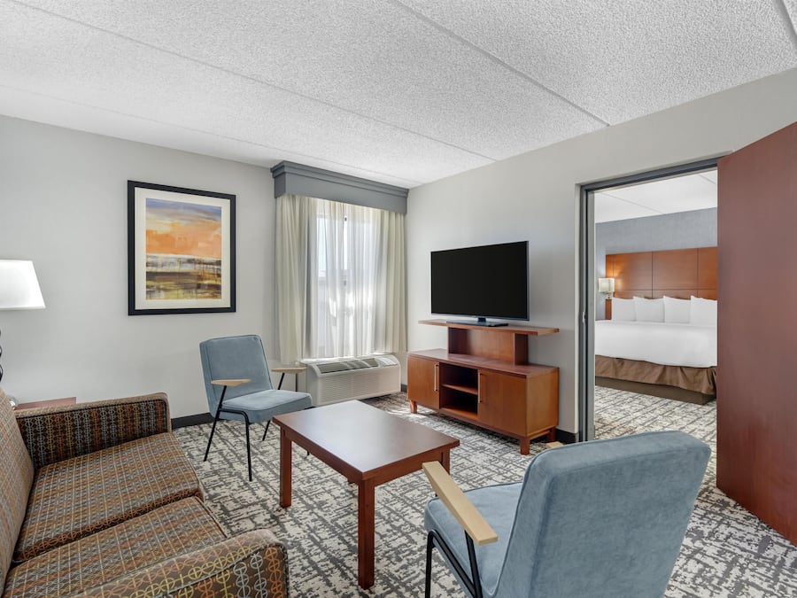 Desk, blackout drapes, iron/ironing board, free cribs/infant beds