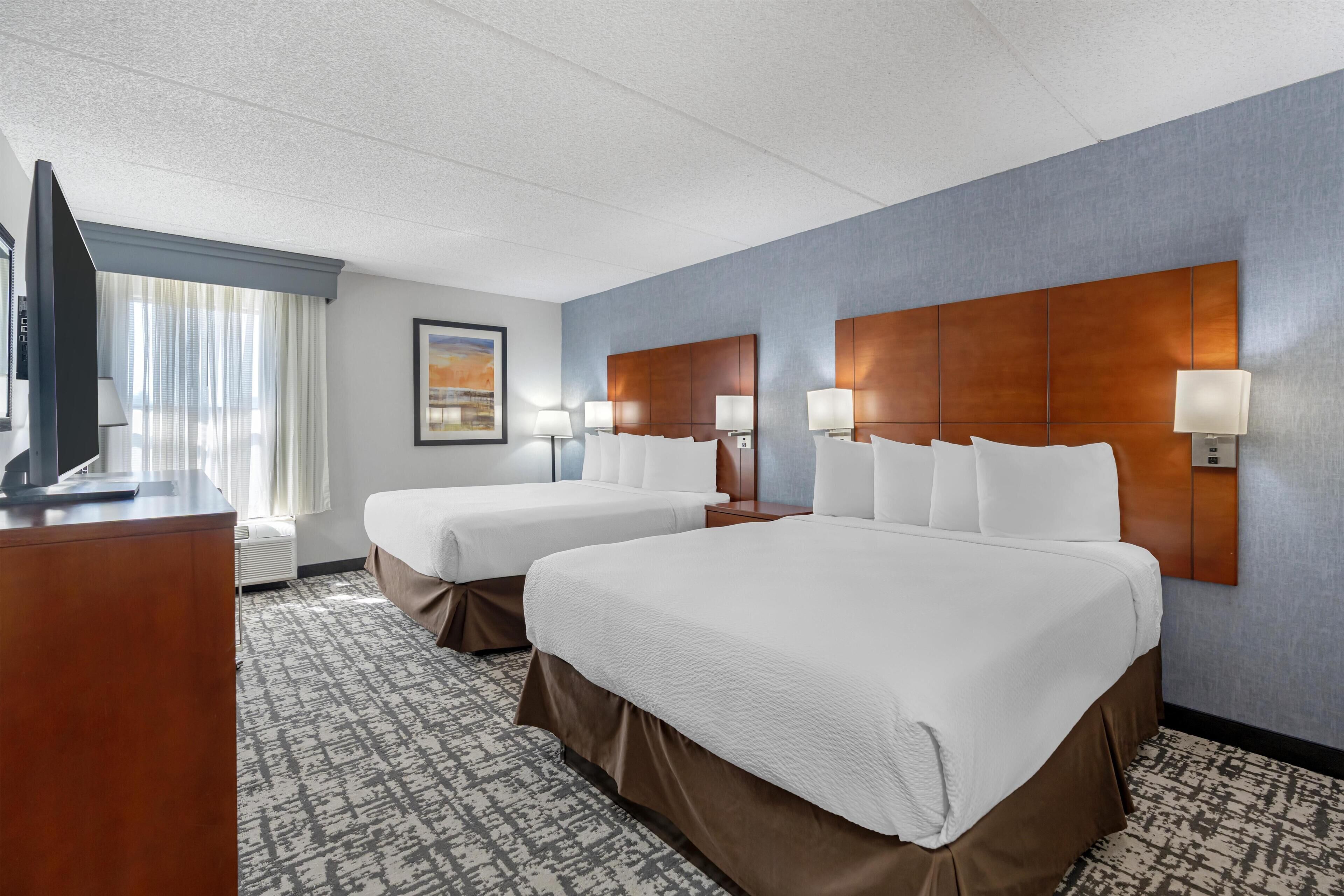 Standardrum - 2 queensize-sängar - icke-rökare - kylskåp | Skrivbord, mörkläggningsgardiner och strykjärn/strykbräda