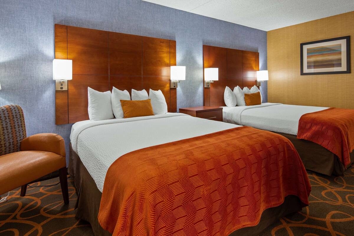 standard room, 2 queen beds, non smoking, refrigerator | desk, blackout curtains, iron/ironing board, free cots/infant beds