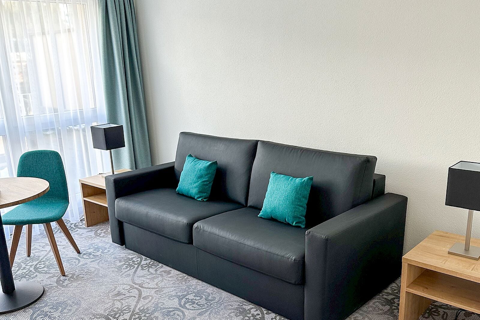 1 bedroom & 1 livingroom suite with balcony | living area | tv