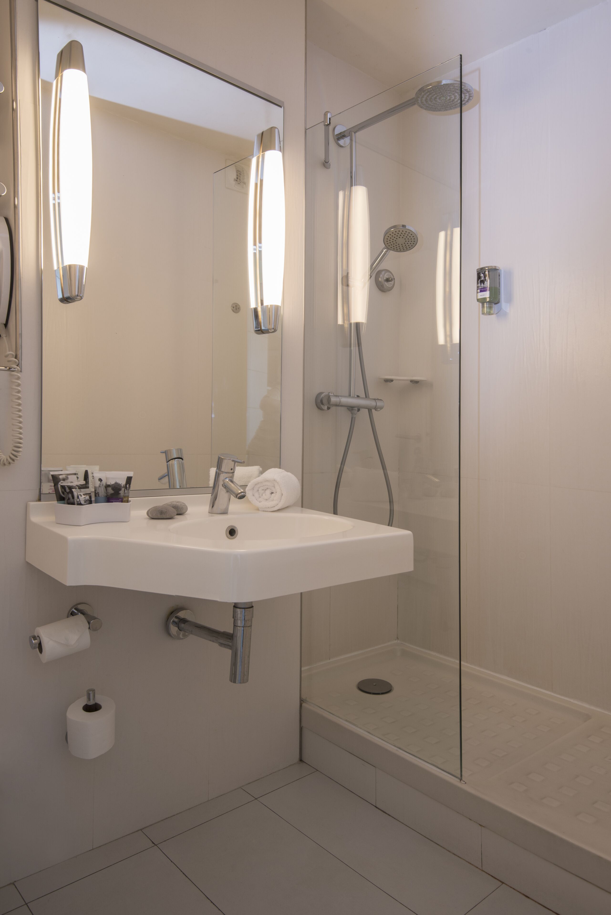 shower, eco-friendly toiletries, hair dryer, towels