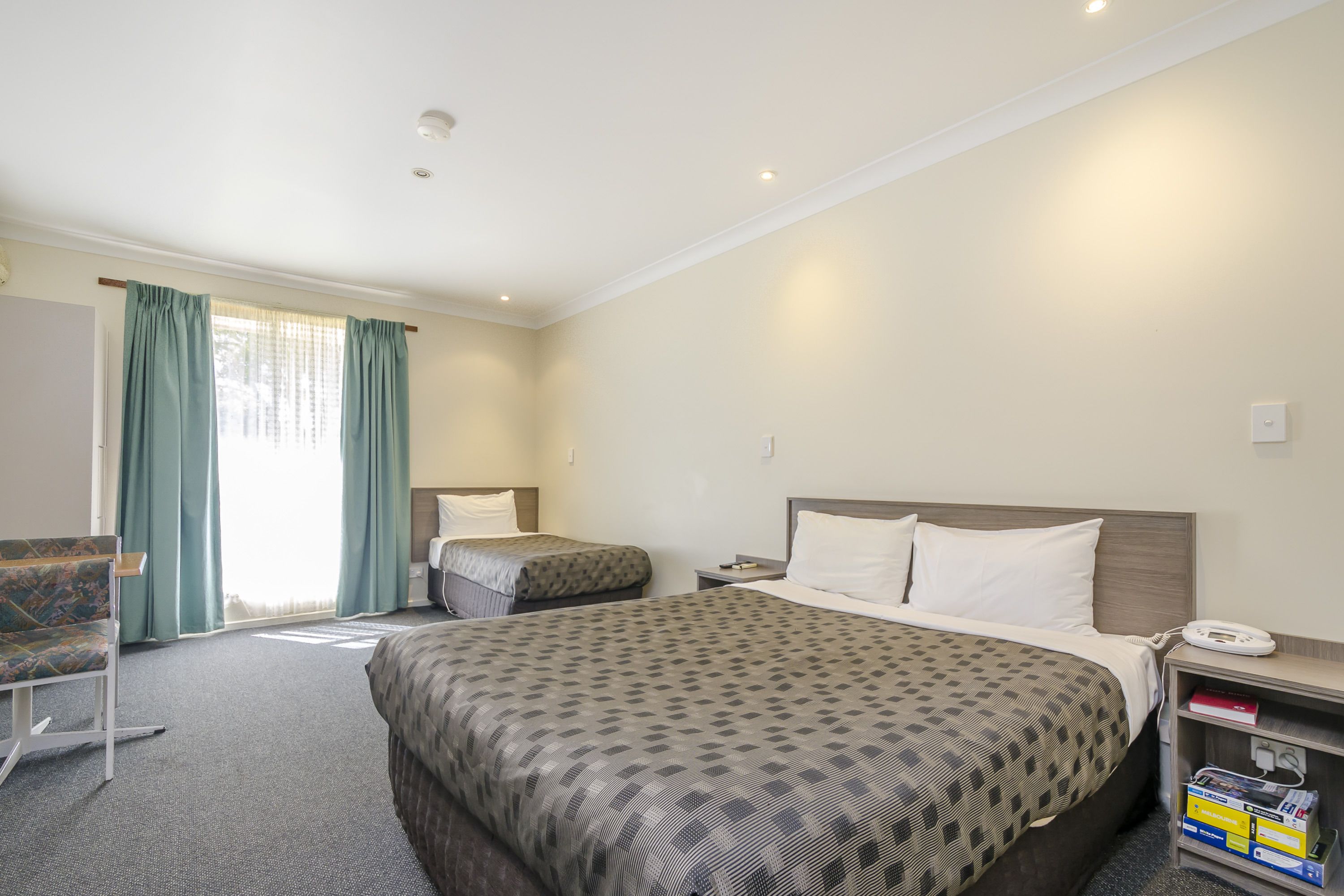 Premium bedding, blackout drapes, iron/ironing board, cribs/infant beds