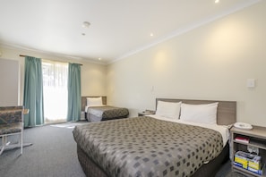 Premium bedding, blackout curtains, iron/ironing board, cots/infant beds