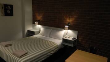 Premium bedding, blackout drapes, iron/ironing board, cribs/infant beds