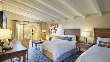 Premium bedding, down comforters, pillowtop beds, in-room safe