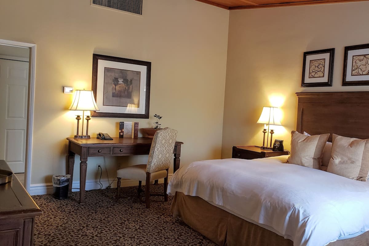 Premium bedding, down duvets, pillow-top beds, in-room safe