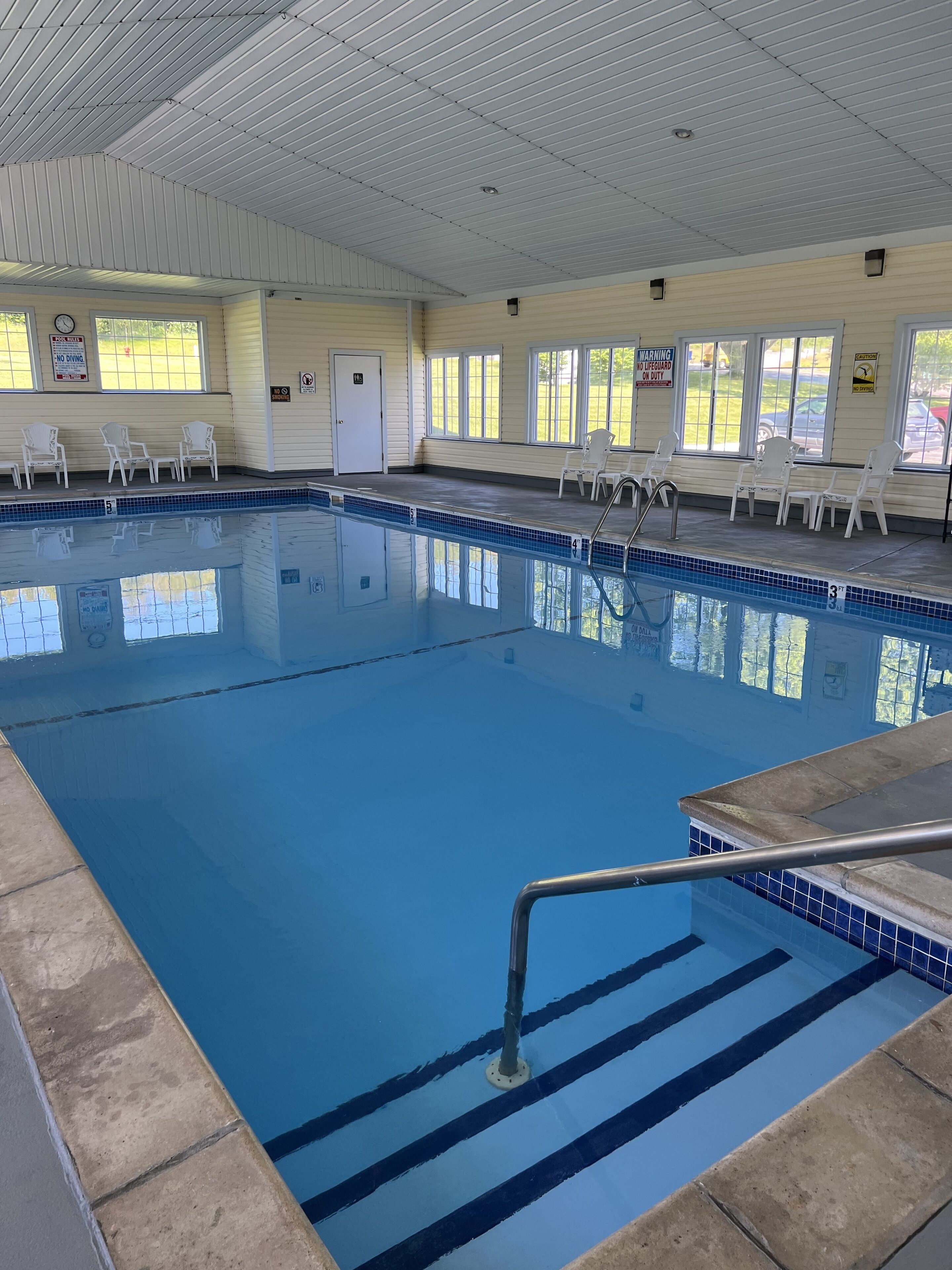 indoor pool, open 9:00 am to 11:00 pm, pool loungers