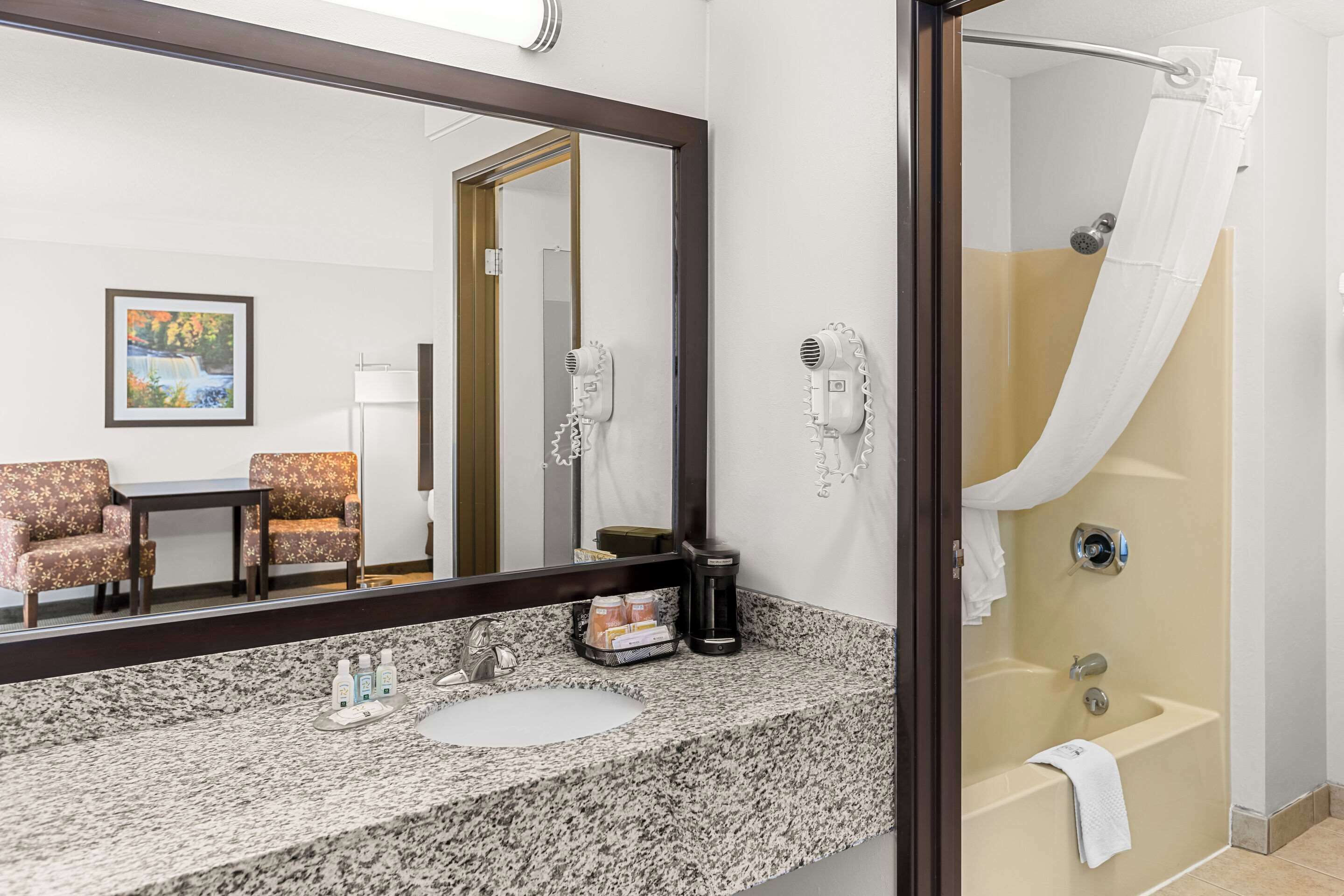 down duvets, select comfort beds, laptop workspace, blackout curtains