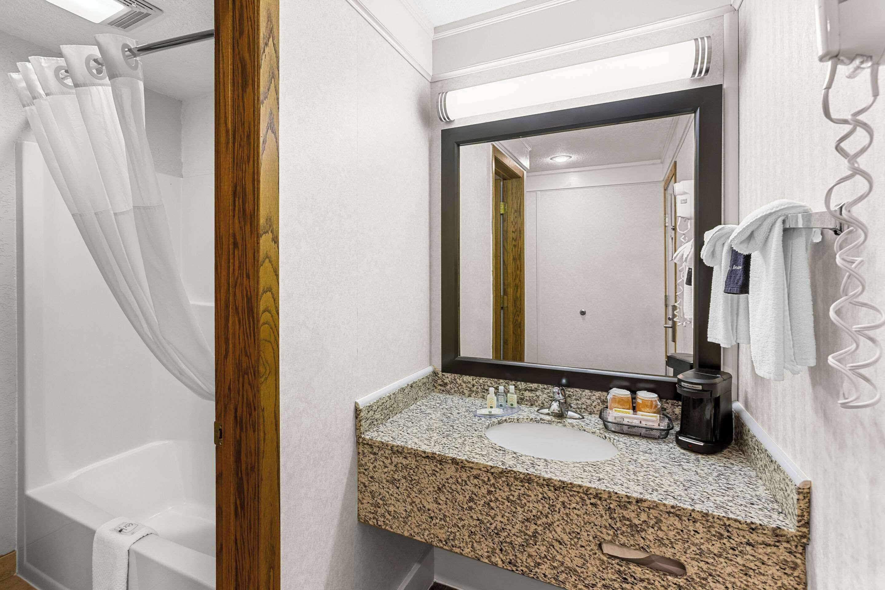 down duvets, select comfort beds, laptop workspace, blackout curtains