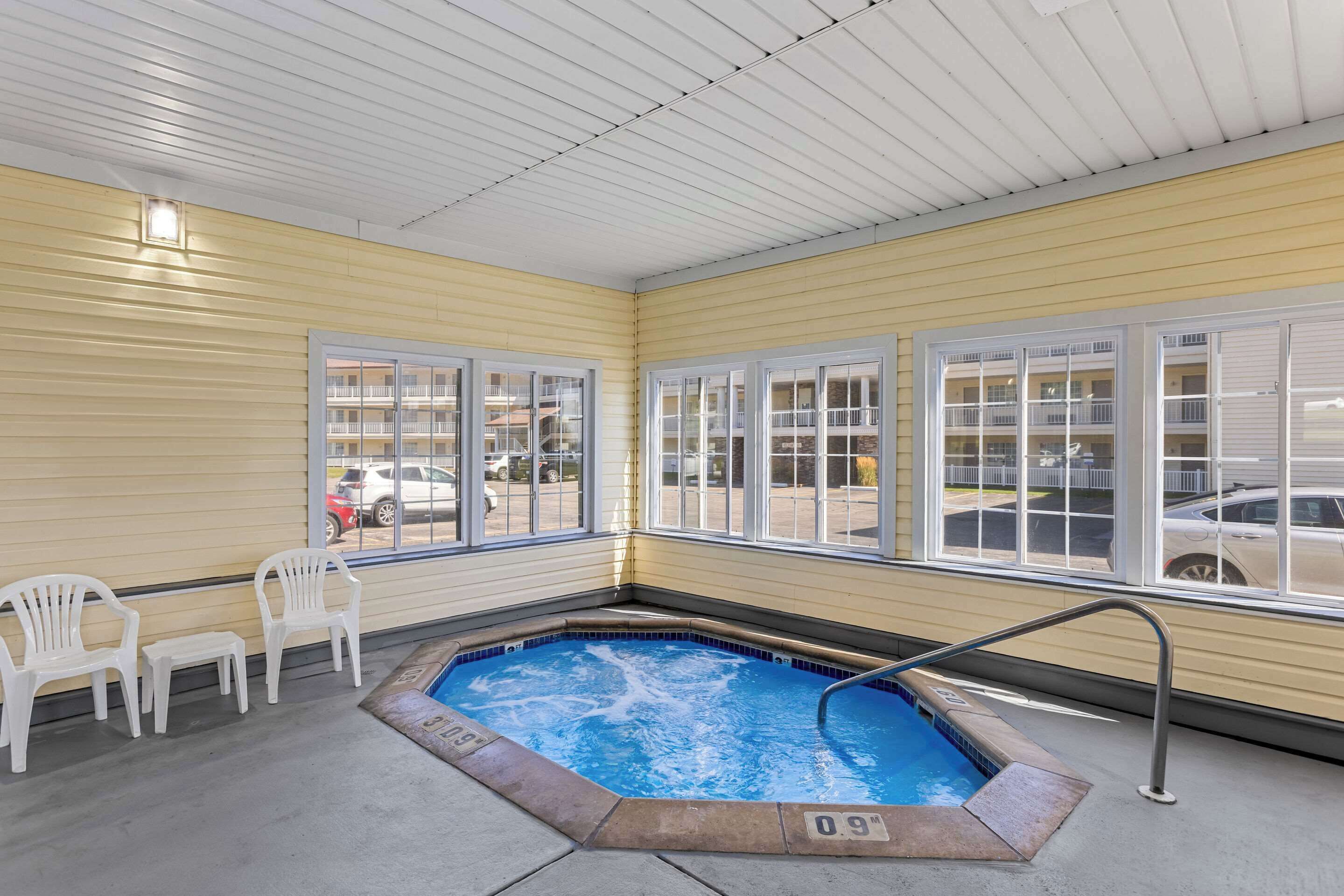 indoor pool, open 9:00 am to 11:00 pm, pool loungers