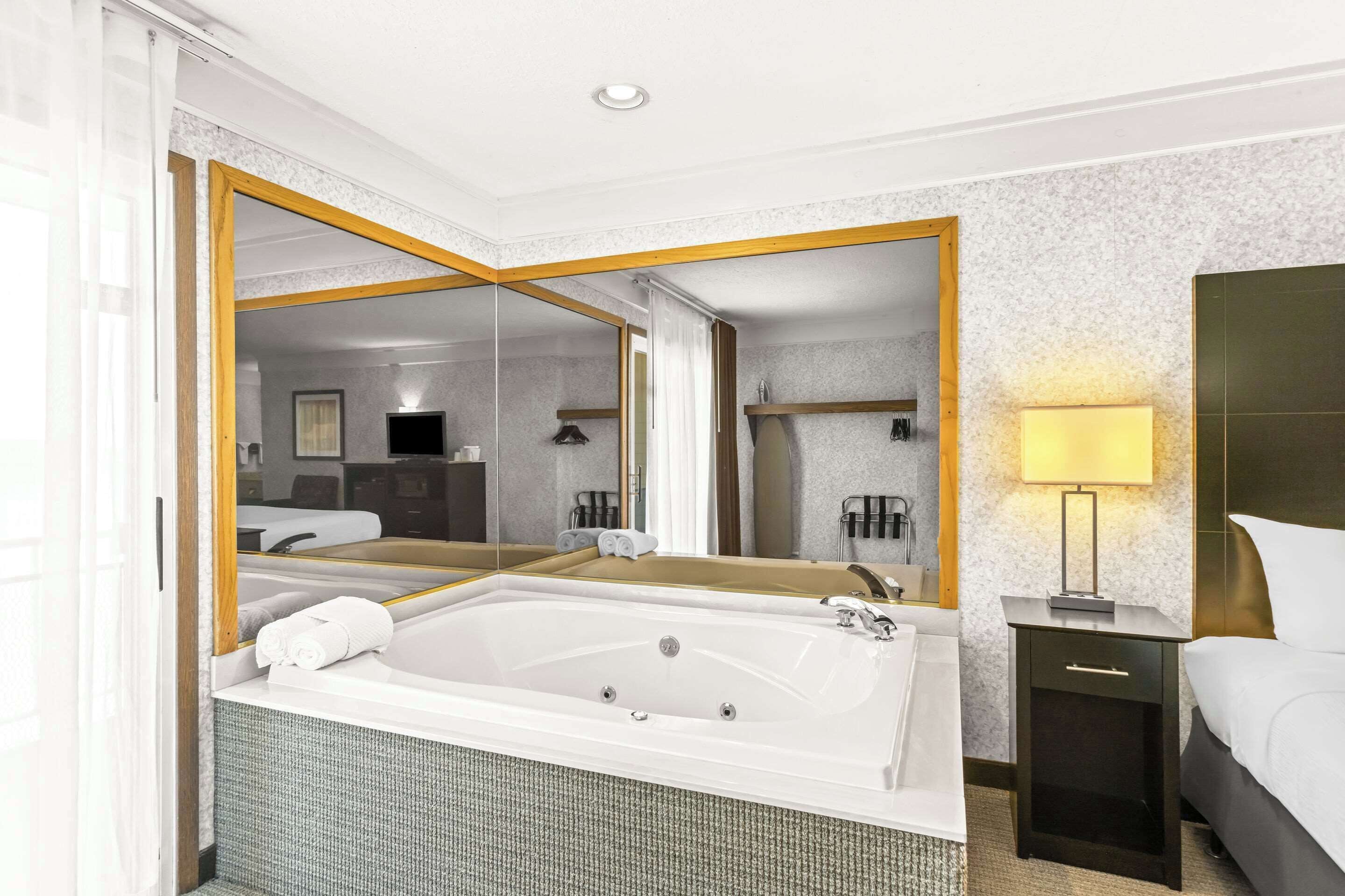 down duvets, select comfort beds, laptop workspace, blackout curtains