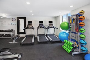A fitness center with treadmills, dumbbells, exercise balls, and resistance bands. - Holiday Inn Express Exton by IHG (Exton)
