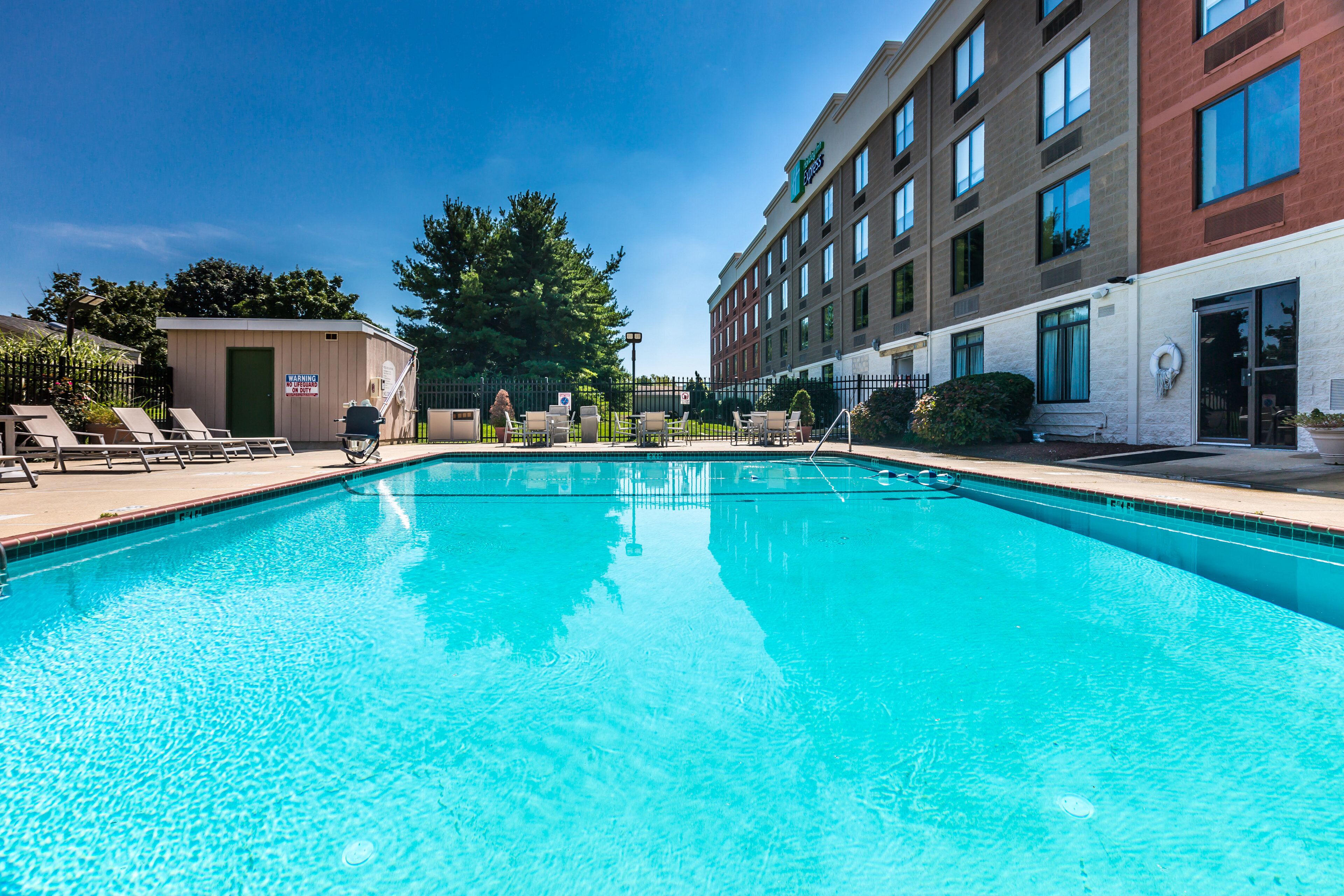 Seasonal outdoor pool, open 10:00 AM to 8:00 PM, pool loungers