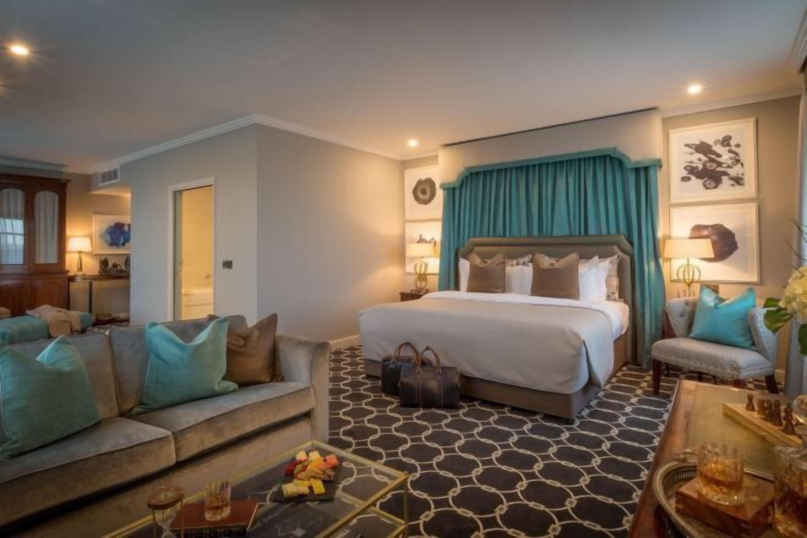 Premium bedding, desk, laptop workspace, blackout drapes