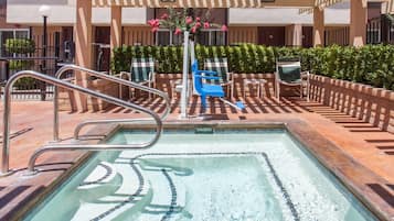 Outdoor pool, open 9:00 AM to 9:00 PM, pool umbrellas, sun loungers