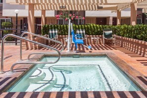 Outdoor pool, open 9:00 AM to 9:00 PM, pool umbrellas, pool loungers