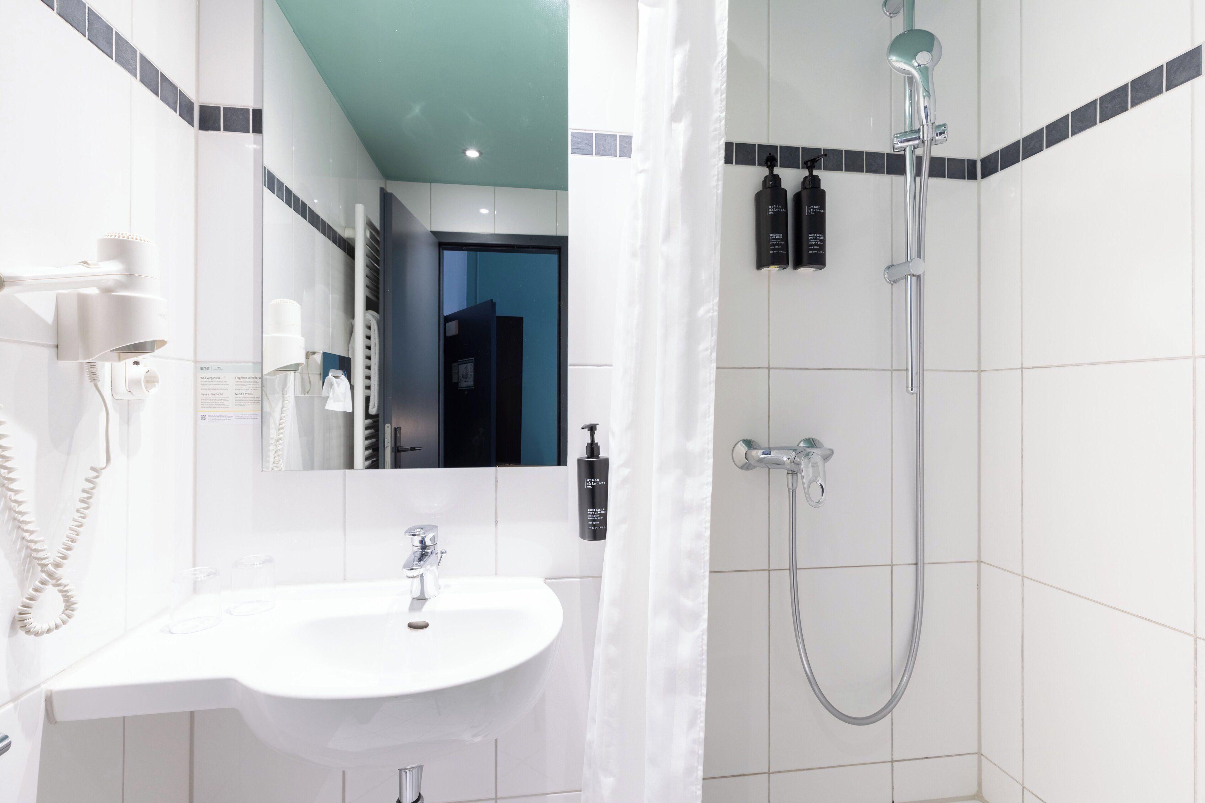 Premium Room, 1 King Bed with Sofa bed (Up to 3 Adults) | Bathroom | Shower, free toiletries, hair dryer, towels